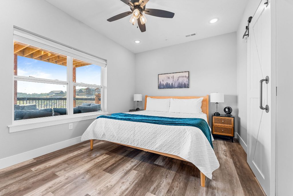 Wake up to the lake! This downstairs king room offers comfort and views you’ll love.