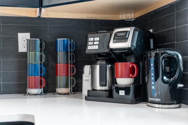 Start your mornings right with fresh coffee or tea from the fully stocked beverage station.
