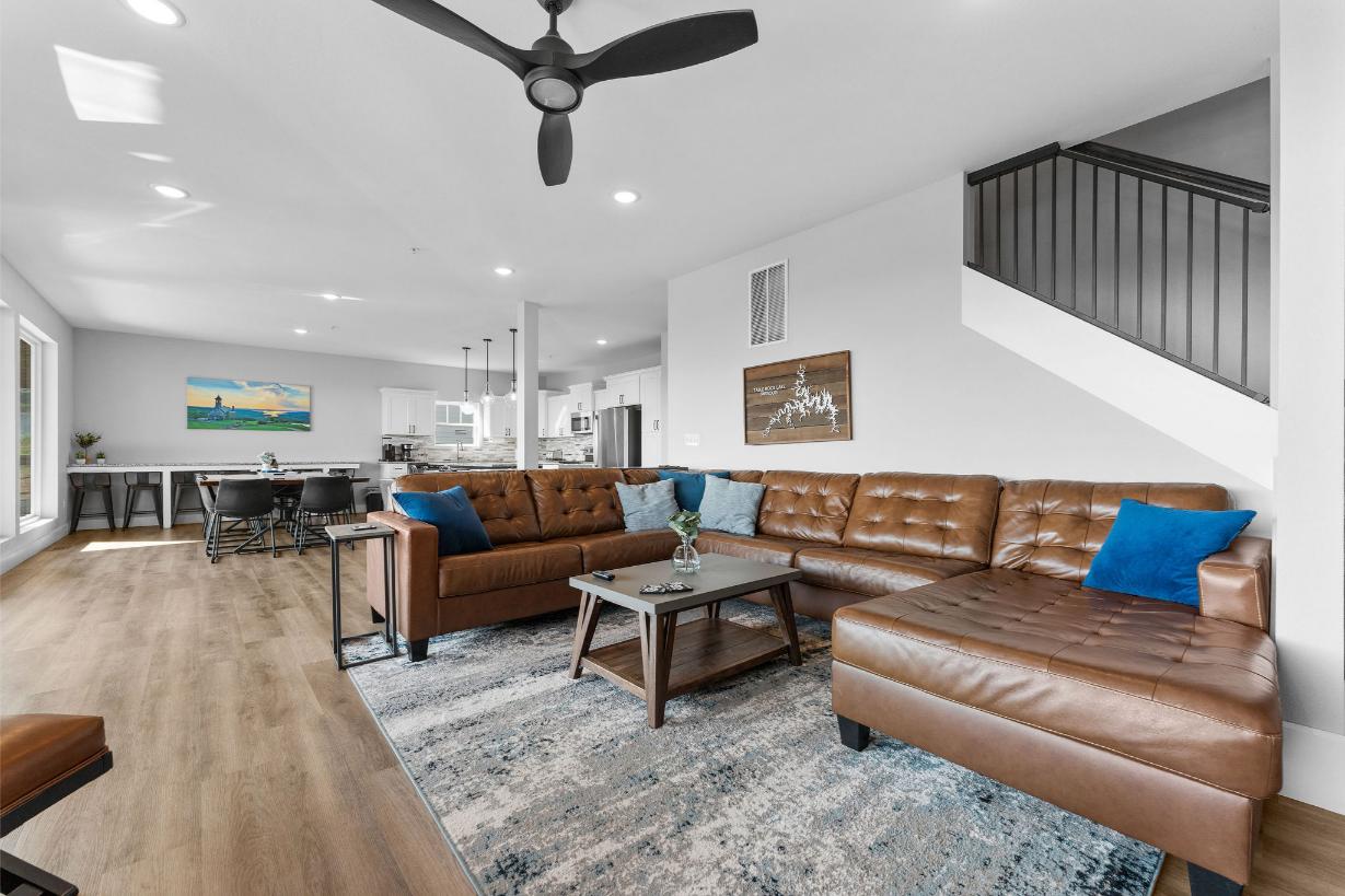 Sink into the comfy couches—perfect for movie nights or lakeview lounging!