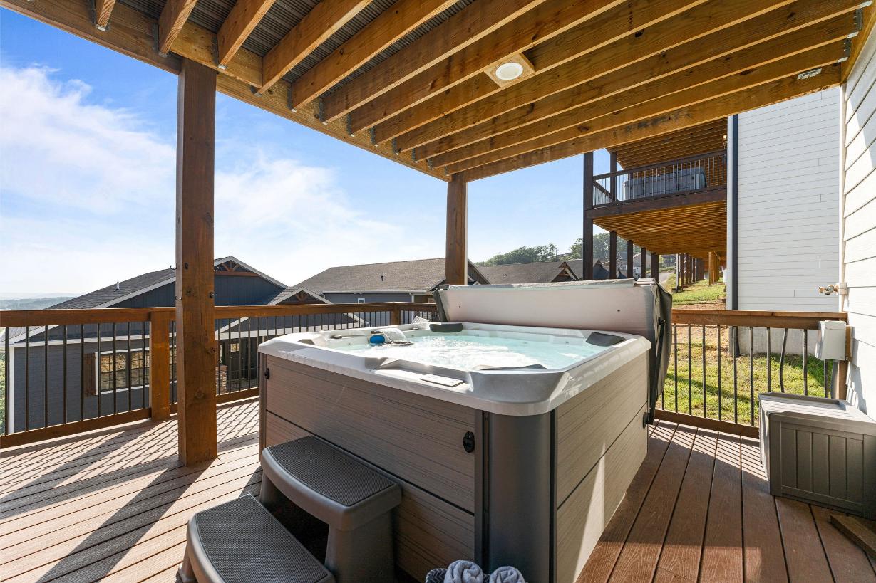 Kick back and soak under the stars in this spacious back deck hot tub!