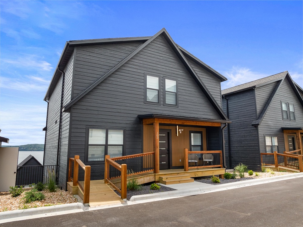 Accessible design includes a ramp and a main floor suite with ADA-friendly features.