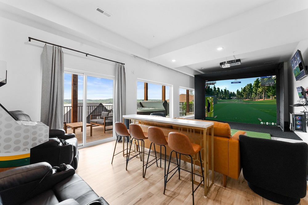 Gather your group at LUX GOLF LODGE—9 bedrooms, 9 bathrooms, a top-tier golf simulator, and Golden Tee arcade make it perfect for both rest and recreation.