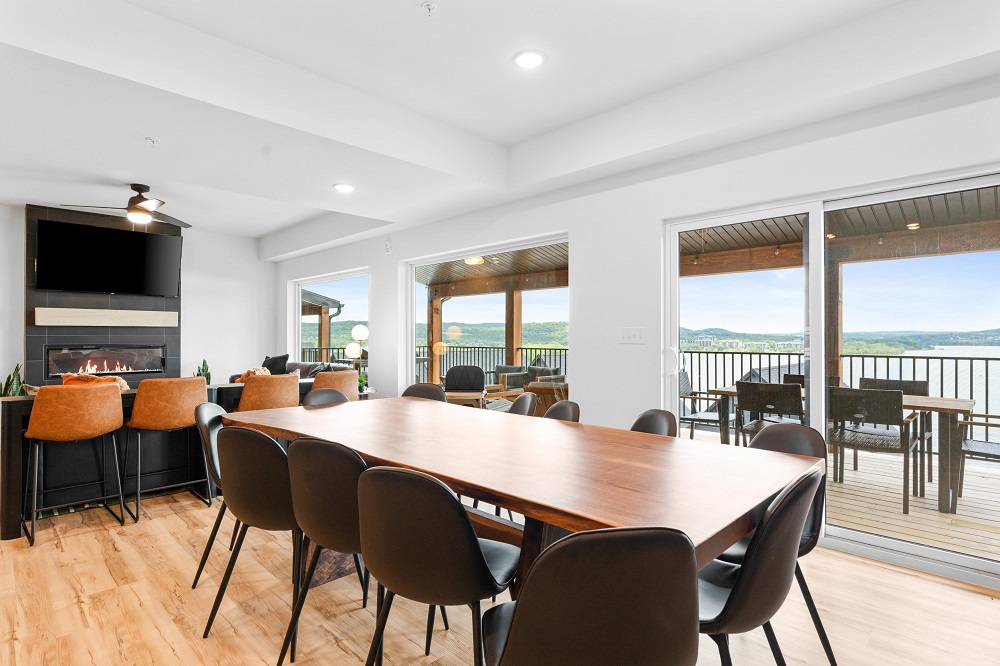 Gather around the large dining table for meals, games, or enjoying lake views from every seat.
