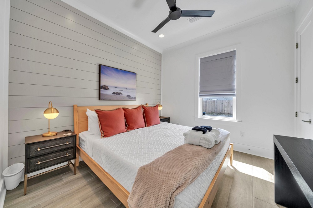 This cozy main-level bedroom has everything you need: king bed, big closet, and TV for laid-back nights in.