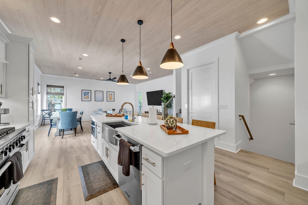 Cook, dine, and hang out together—all in one bright, open space that brings the whole group together.