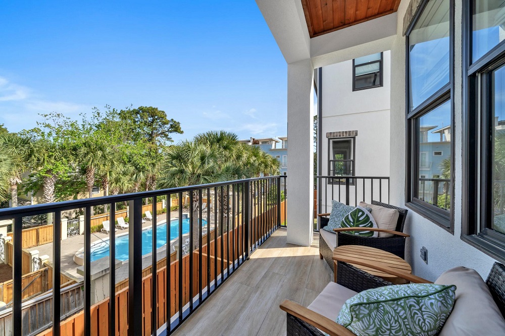 Sip your coffee in the morning breeze or curl up with a book—this cozy balcony is your personal escape.