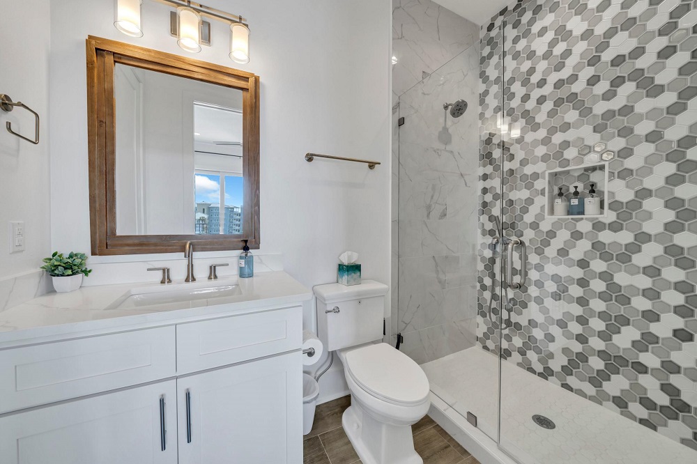 Rinse off in the modern tile shower—stocked with essentials so you can pack light and relax more.