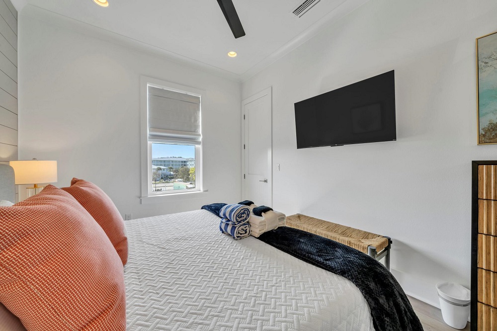 Wake up to beach views in this serene king suite—your private retreat with a smart TV and ensuite bath.