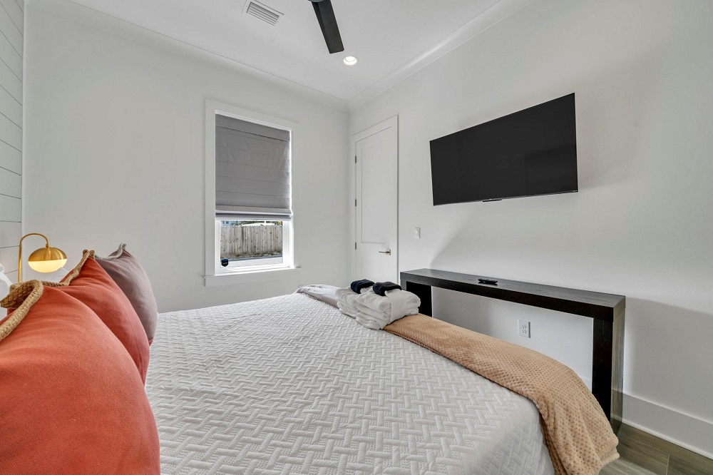Perfect for guests—this main floor bedroom connects to a full bath, making mornings a breeze.