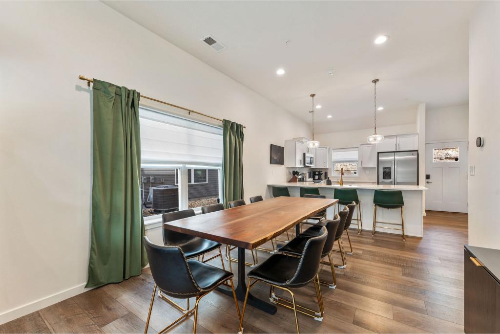 From family dinners to card games—everyone can gather around this stunning custom table with lake views.