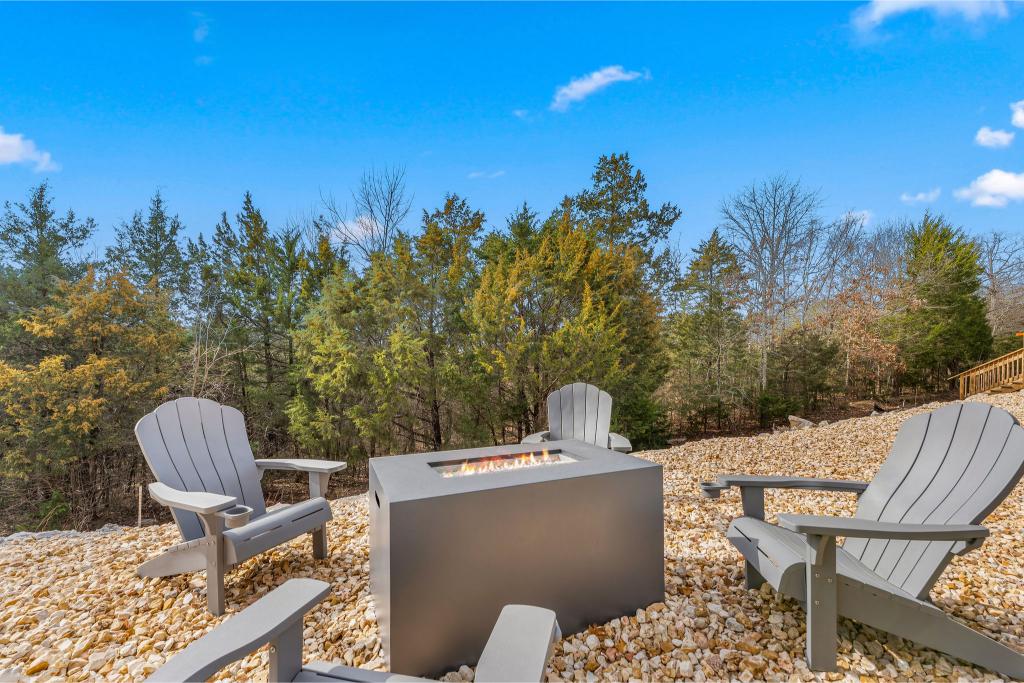 Gather around the fire table, kick back with a drink, and take in those tranquil lake vibes.