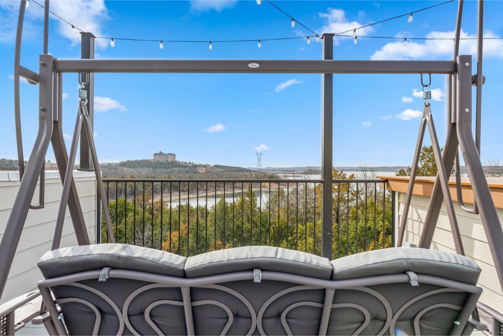 The rooftop deck provides amazing views of Table Rock Lake and has various seating and space to enjoy the area.