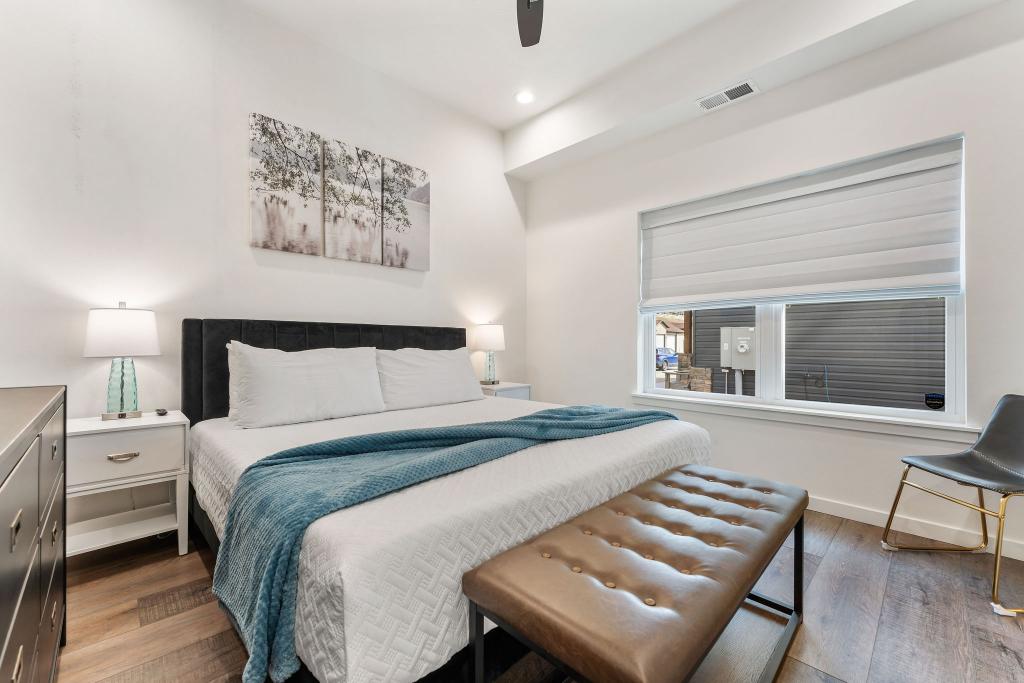 Sleep in style with a plush king bed and your own private bathroom—no stairs required!