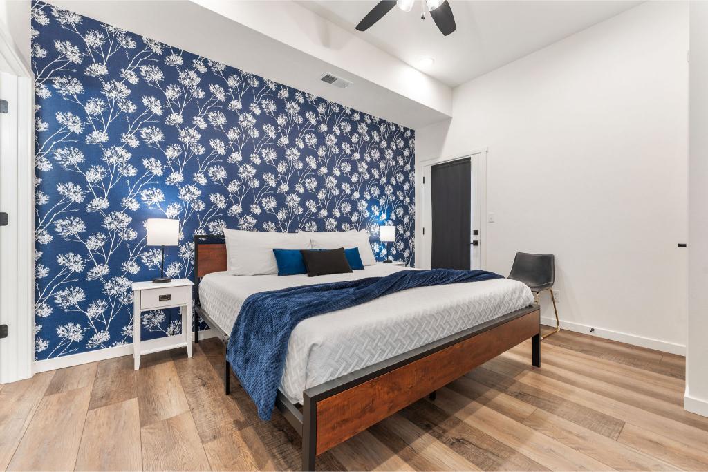 Let the sunlight in and step out to lake views—this upper-level suite is pure comfort.