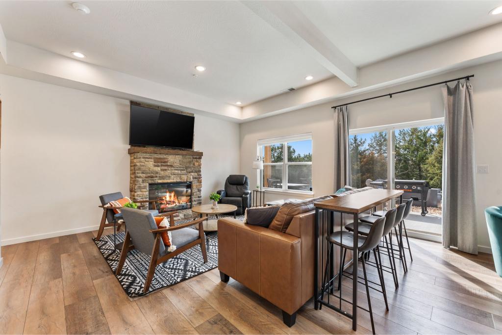 Snuggle up by the glow of the fireplace with your favorite people and a warm drink in hand.