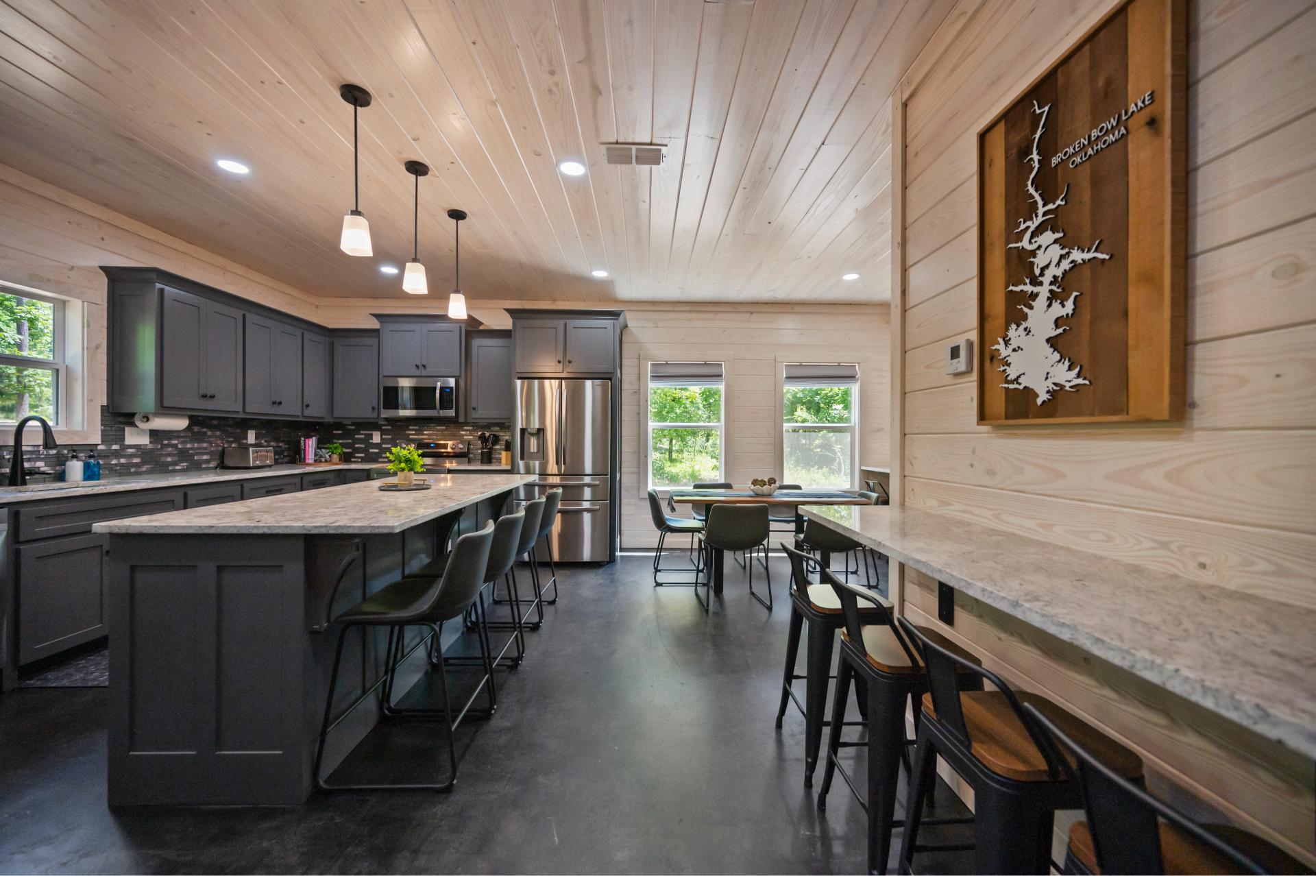With plenty of counter seating, this kitchen invites everyone to gather, graze, and laugh together while meals are prepared.