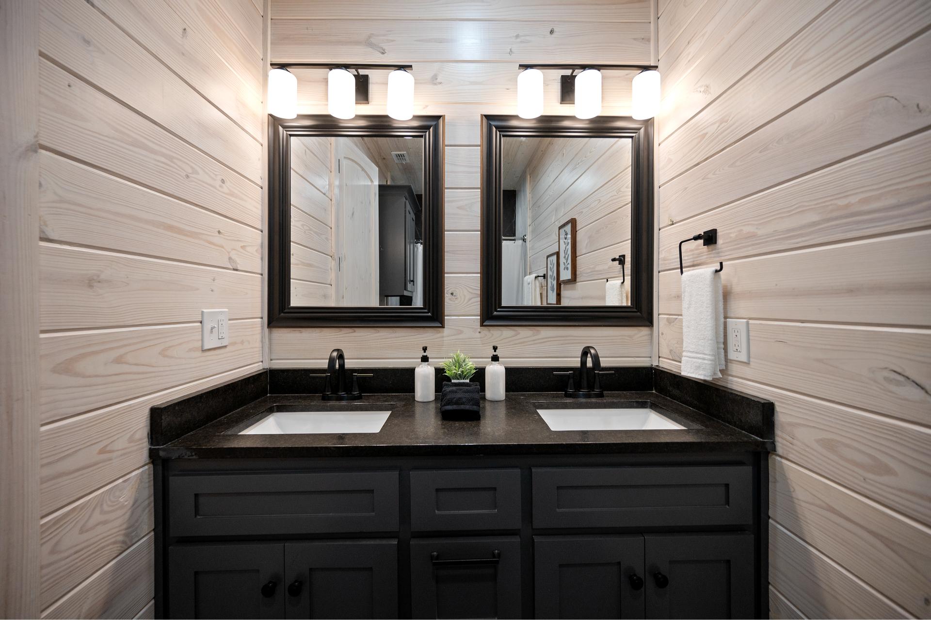 Your private retreat awaits—unwind in this spacious king suite with its own bathroom and double vanity for easy mornings.