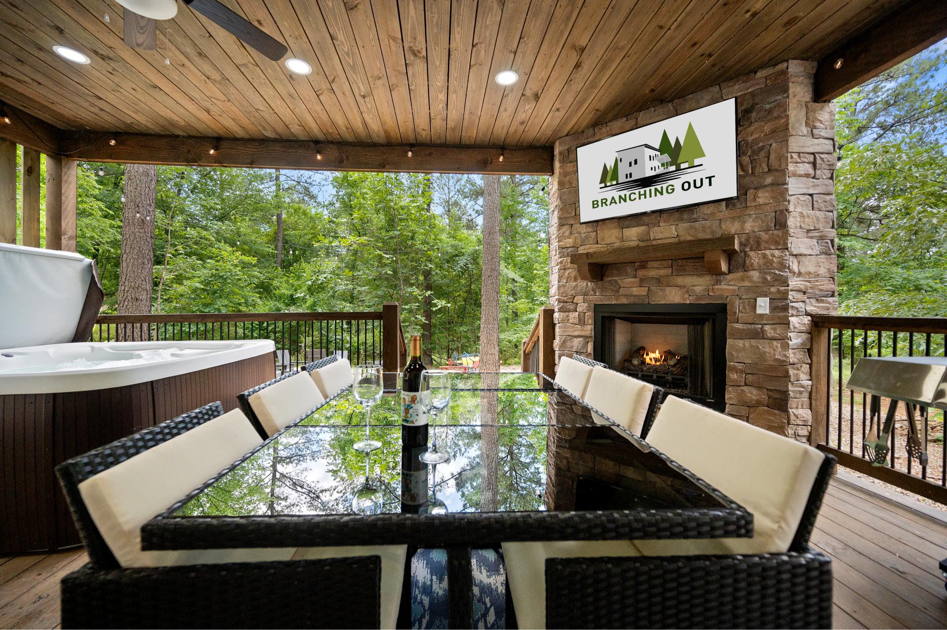 Rain or shine, the back decks are made for good times—grill, soak, dine, or cozy up by the fire in total comfort.