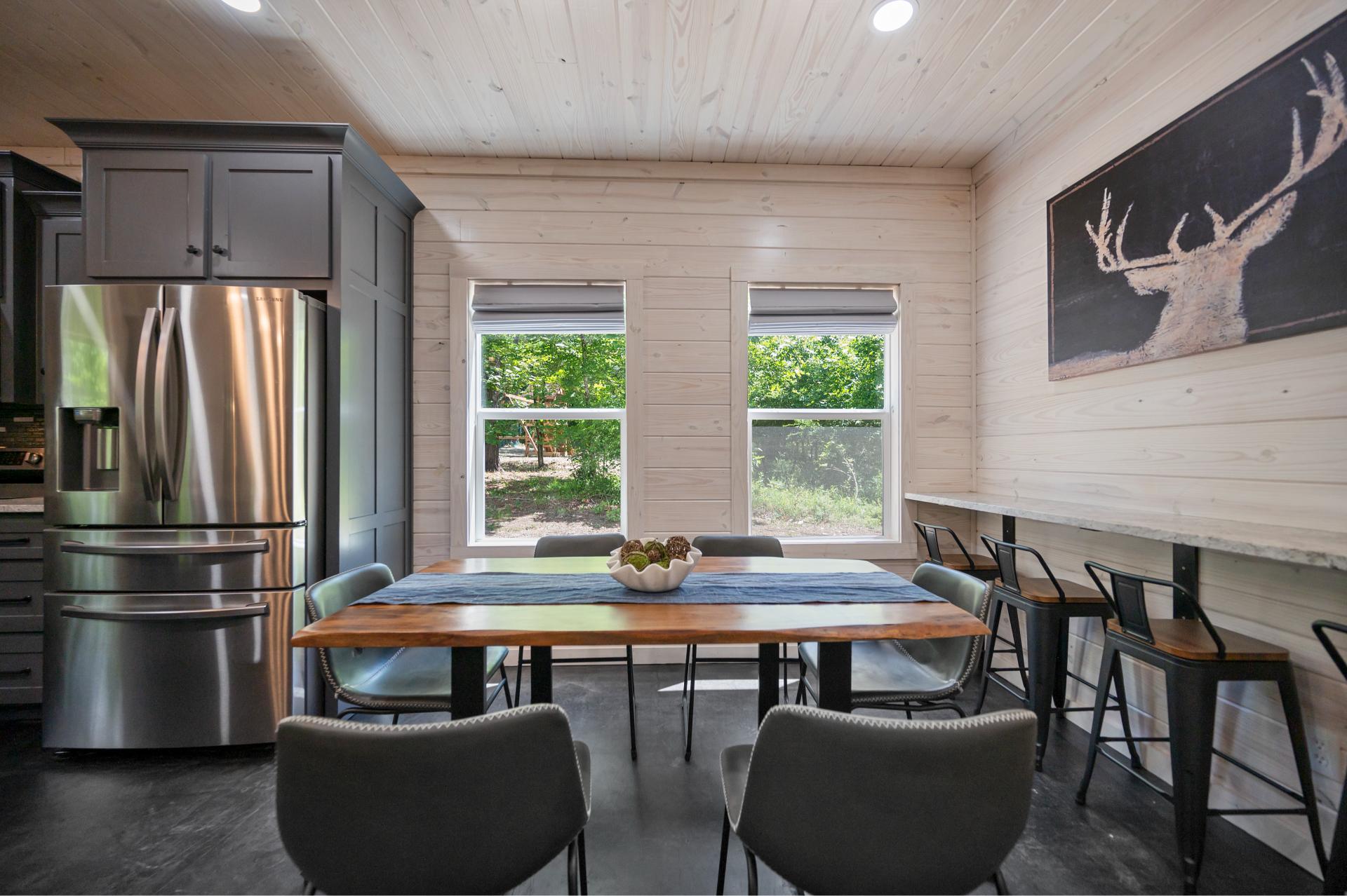 Gather around this gorgeous live-edge table for dinner with a view—there’s room for everyone to relax and connect.