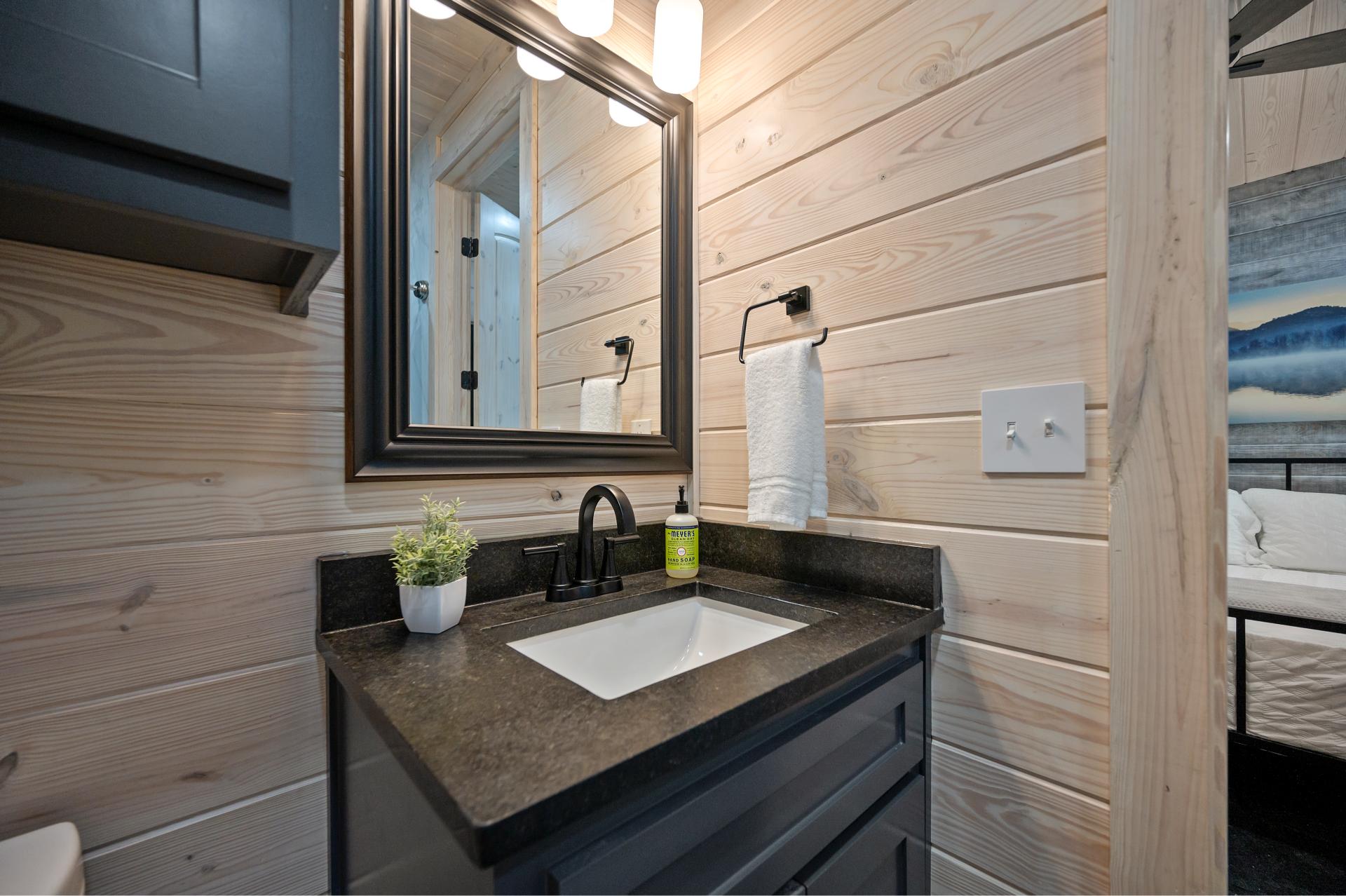 Start and end your day in style—this granite vanity adds a sleek and polished feel to your bathroom routine.