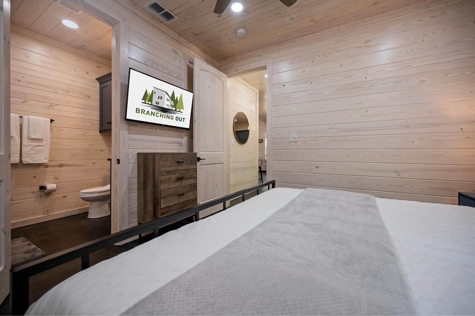 Unwind your way with plenty of space, smart TV, and private ensuite in this cozy and connected king bedroom.