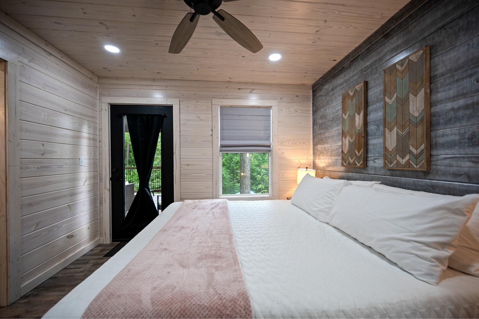 Roll out of bed and right into the fresh air—this king suite opens straight to the deck for instant relaxation.