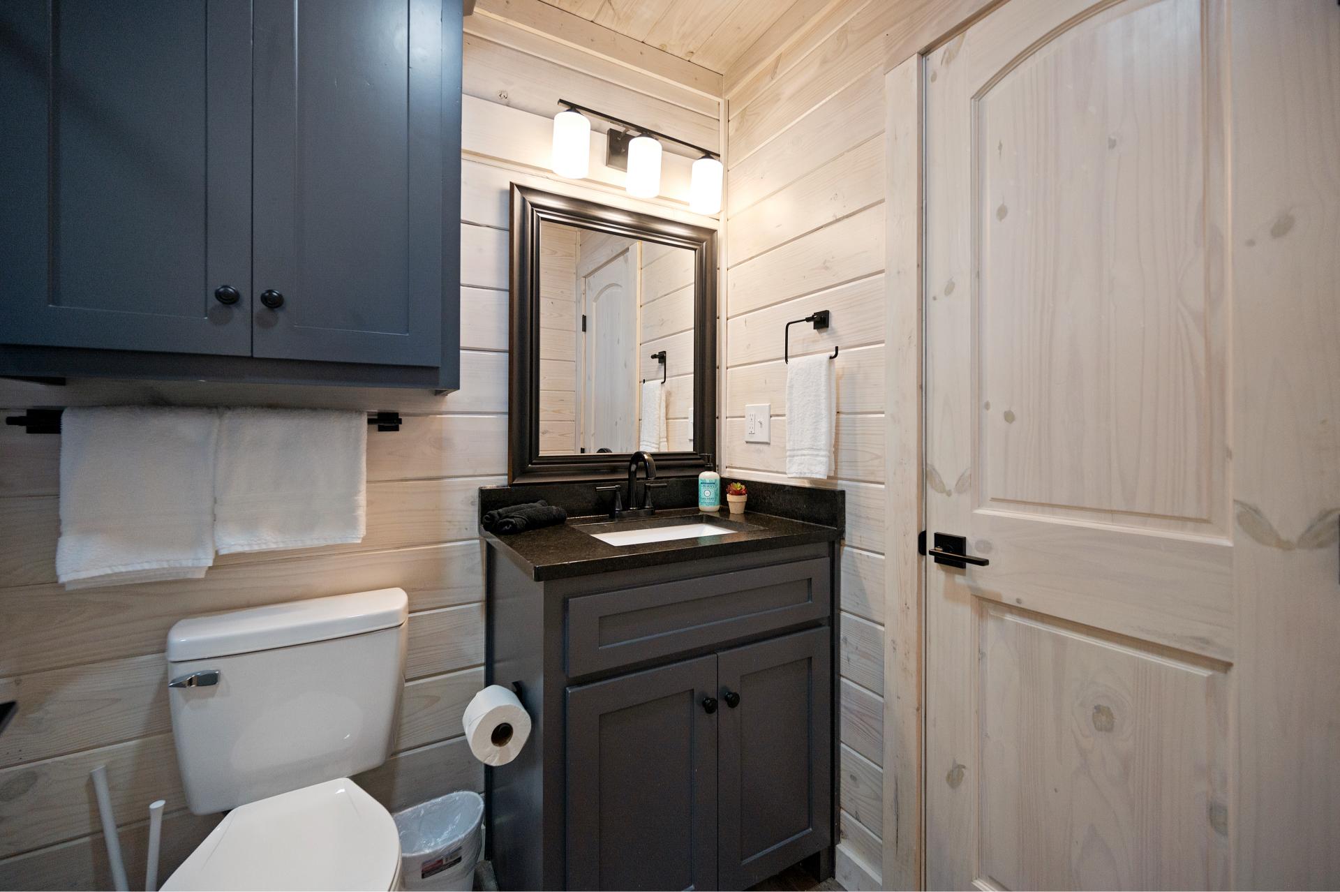 Plenty of room to spread out your things—this stylish bathroom keeps everything tidy and within reach.
