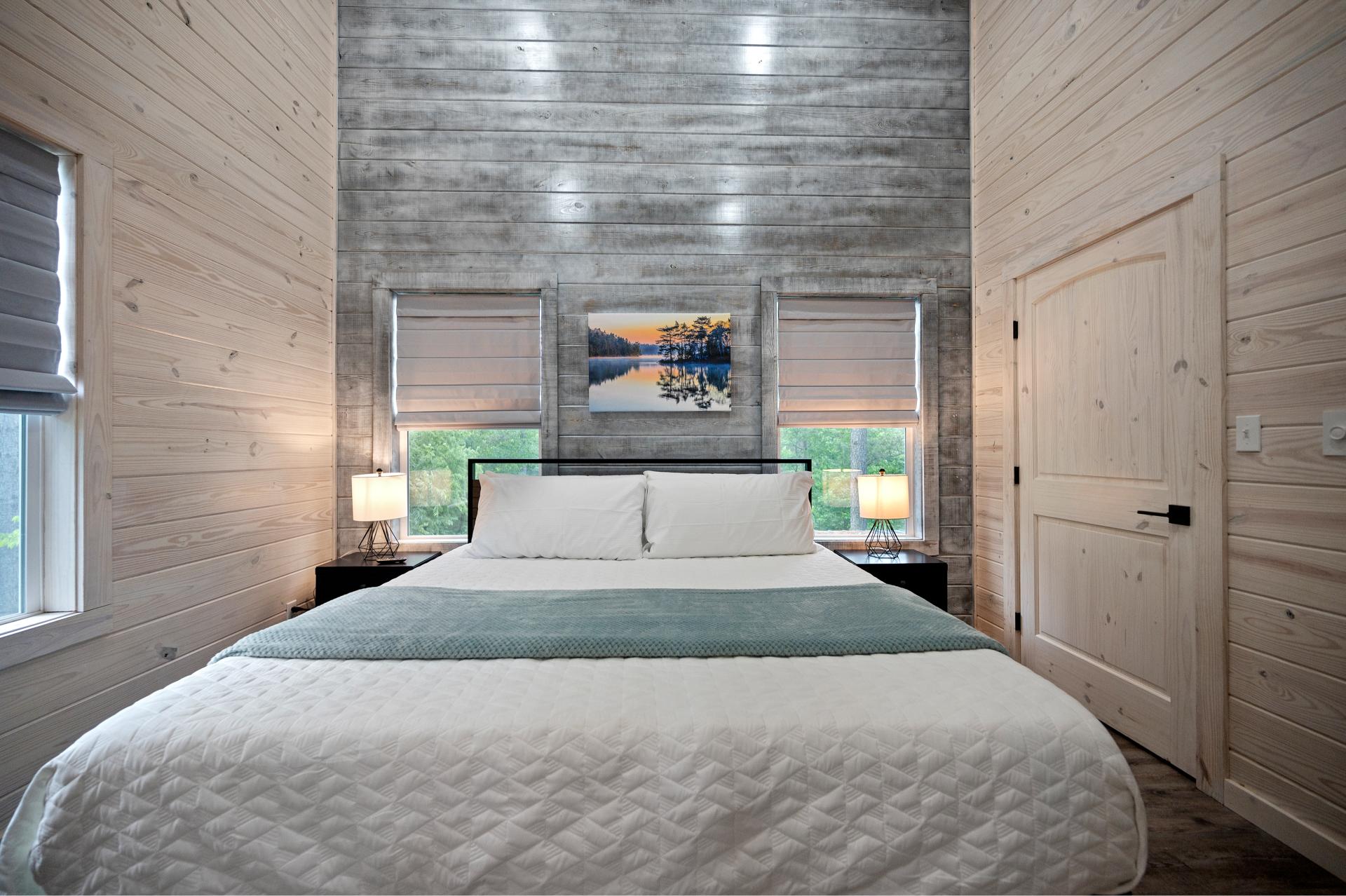 Drift off among the treetops in this peaceful master suite nestled high above the forest floor.