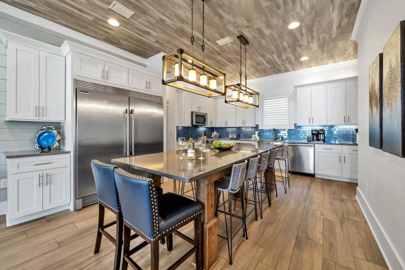 Spacious chef’s kitchen with seating for 14—perfect for gathering, cooking, and sharing meals all in one welcoming space.