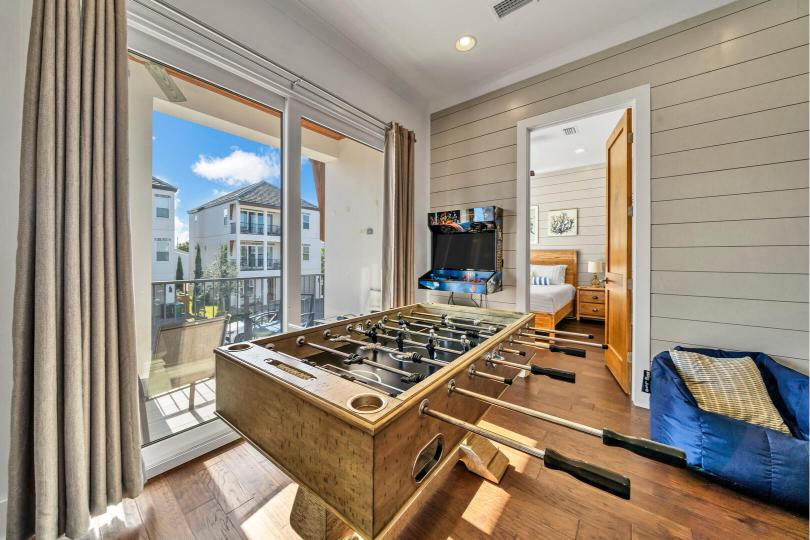 Foosball and arcade games in the 2nd-floor den—perfect for nonstop fun and friendly competition!