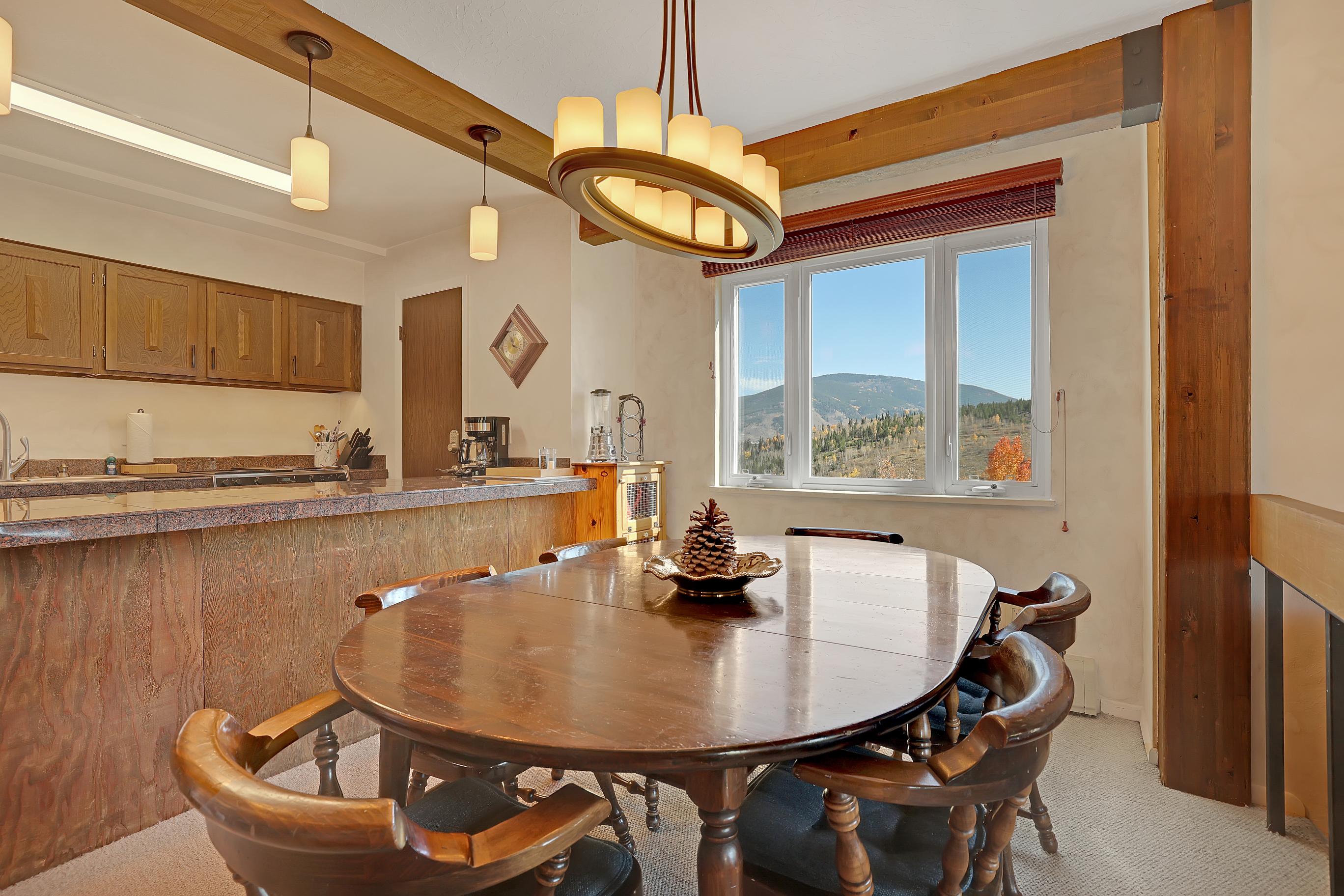 Dining with more amazing views! Table seats 6 + High Chair available for our youngest guests with a fully stocked kitchen