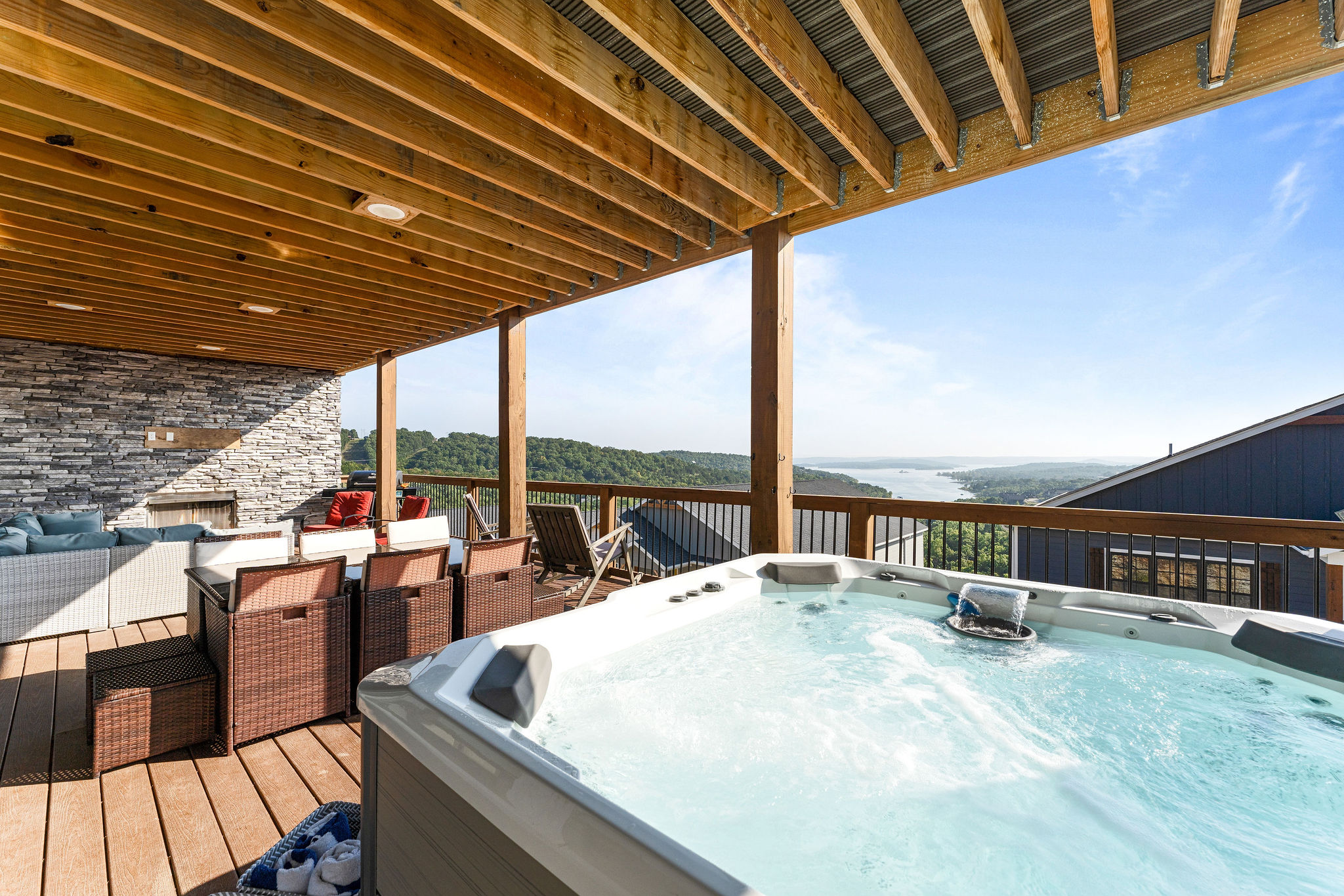 Soak in the hot tub or warm up by the fire—these lakeview decks are made for every season!