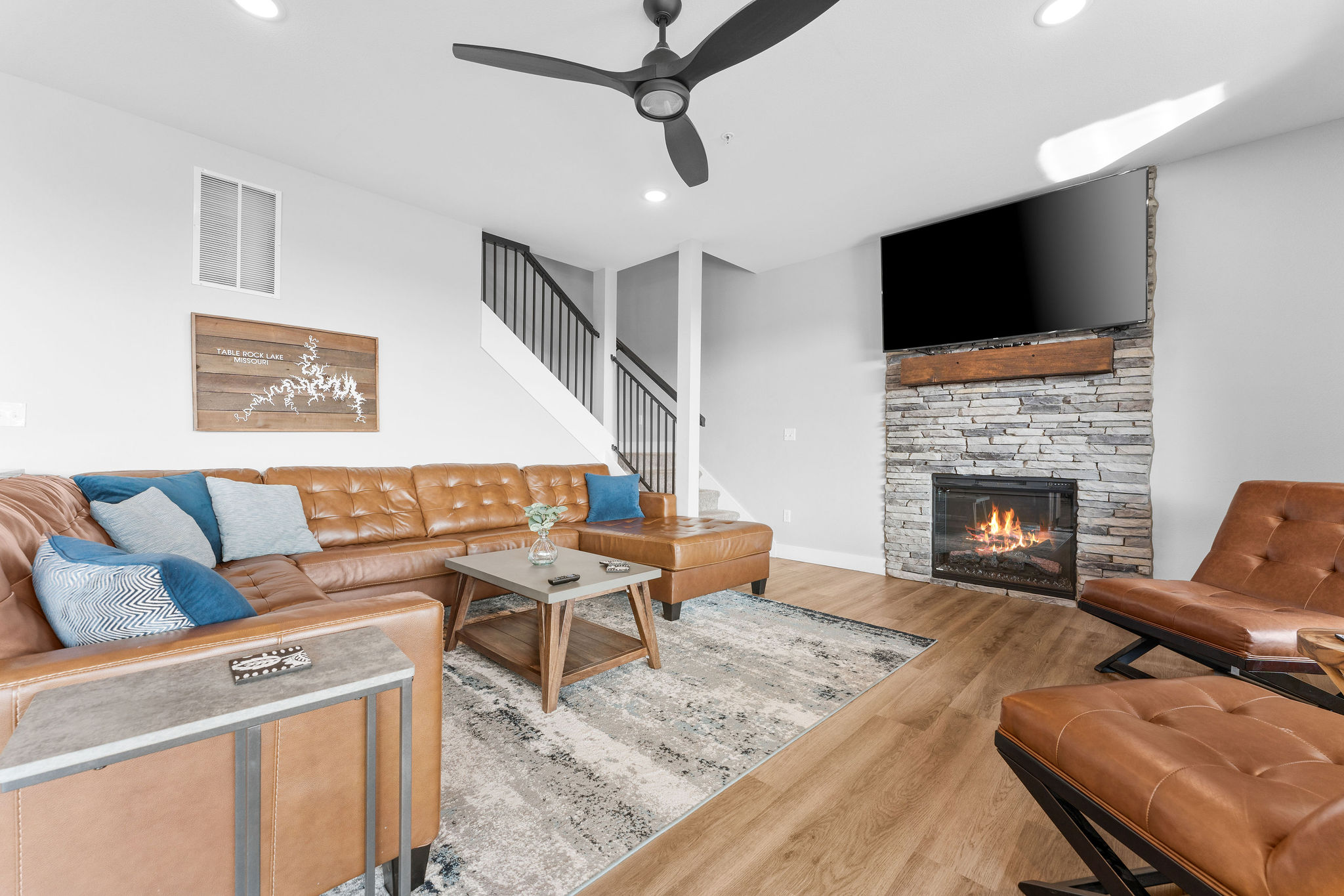 Kick back and relax—this comfy living room connects you to the kitchen, dining, and great conversation.