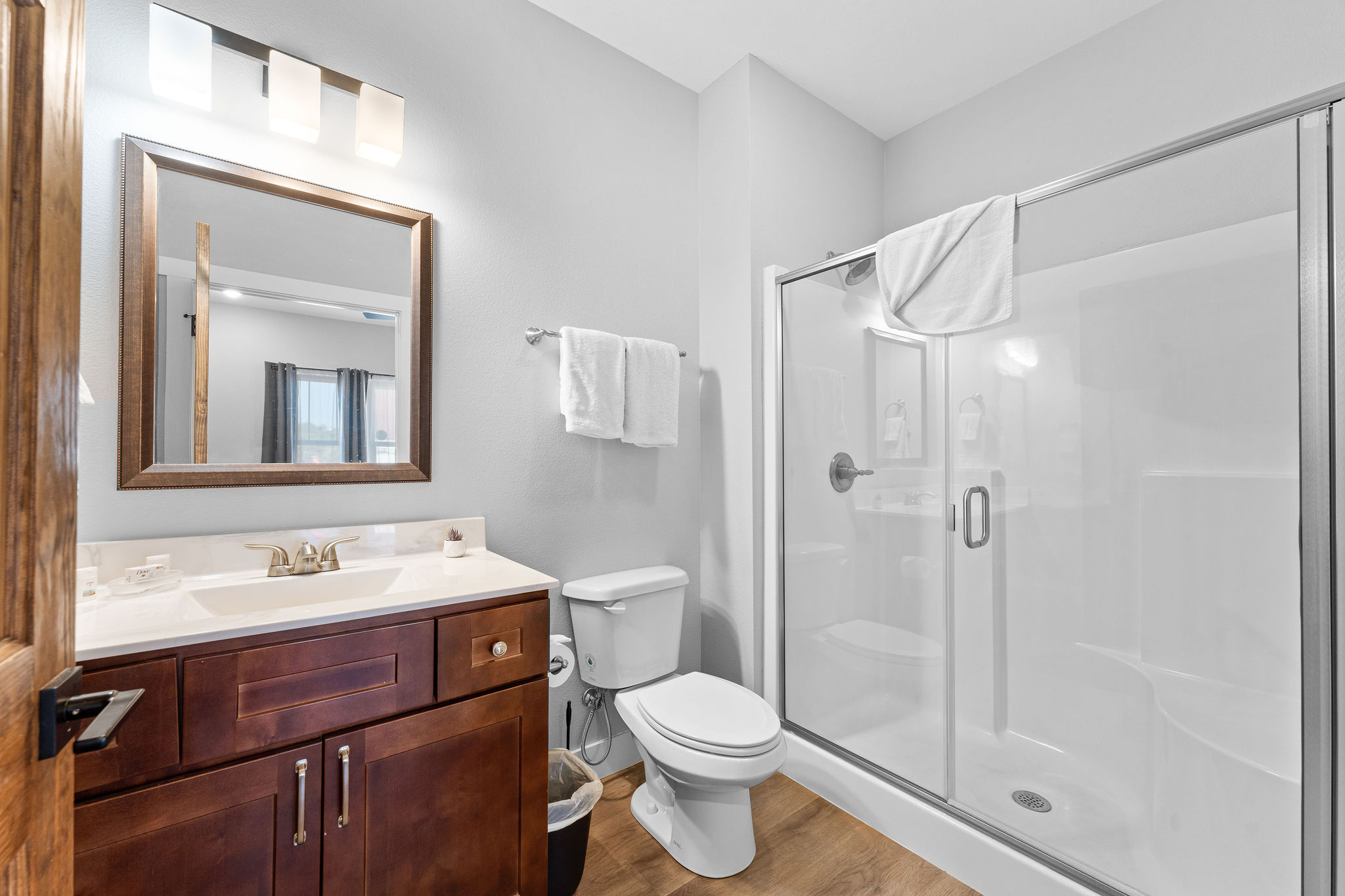 Refresh and relax in the sleek walk-in shower just steps from your king bed.