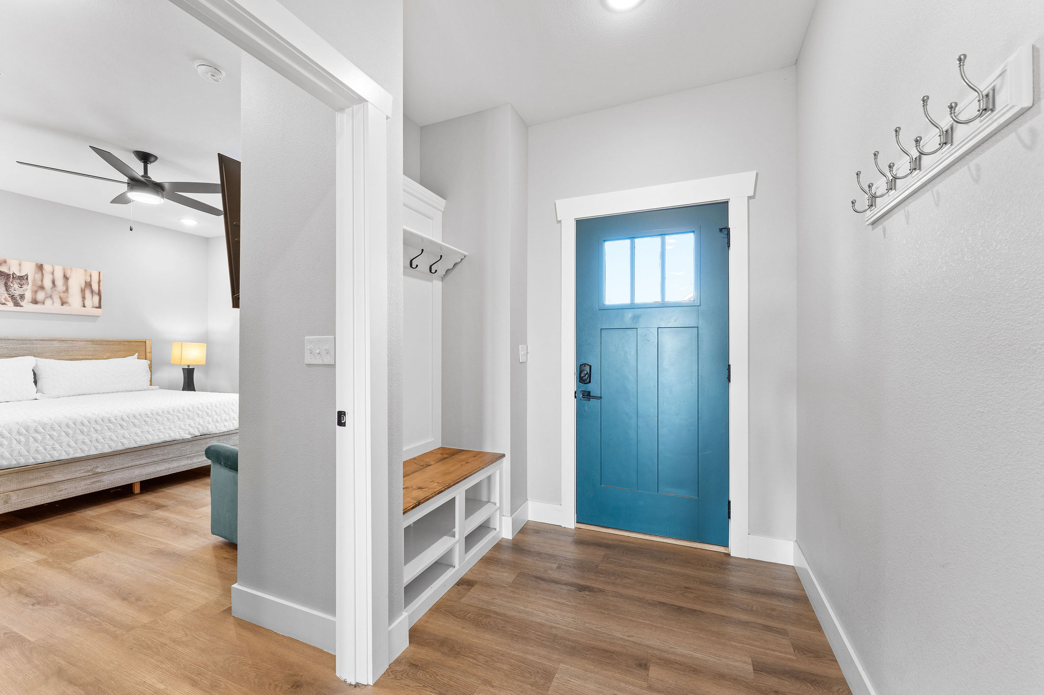 Kick off your shoes and get comfy—the entry’s got space for everyone’s stuff!