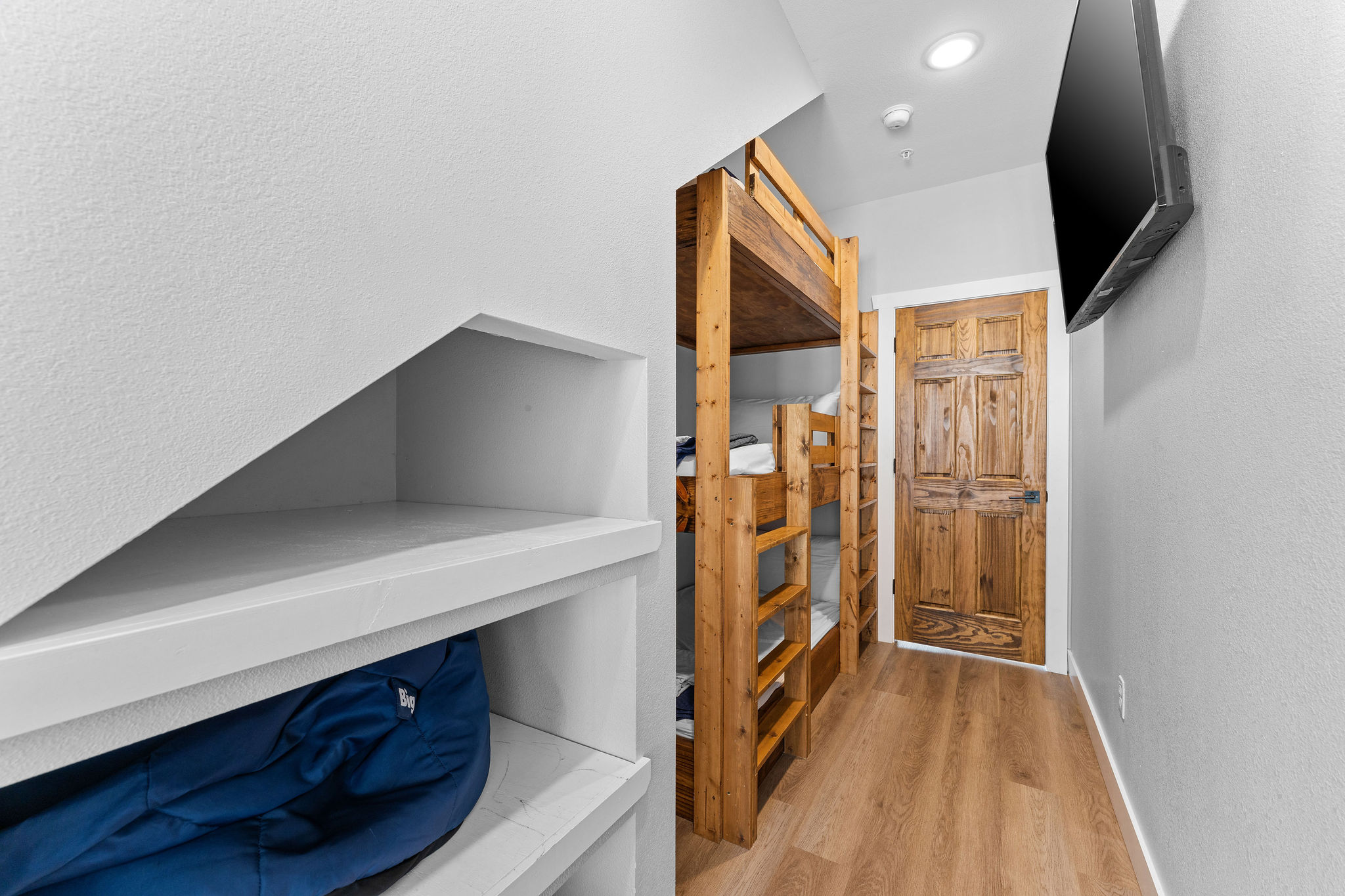 Sleepover heaven! This bunk room fits all the kiddos comfortably and playfully.