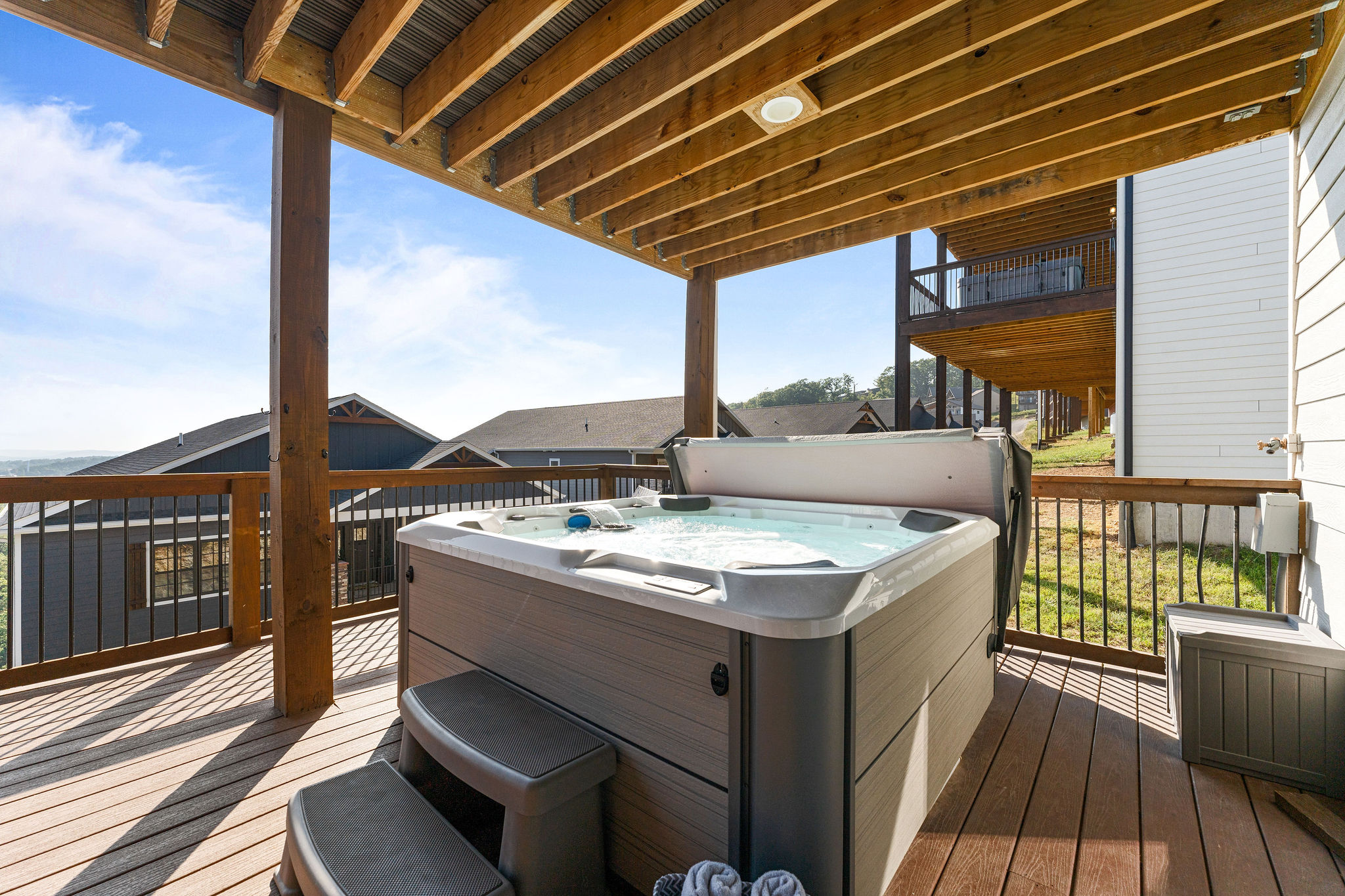 Kick back and soak under the stars in this spacious back deck hot tub!