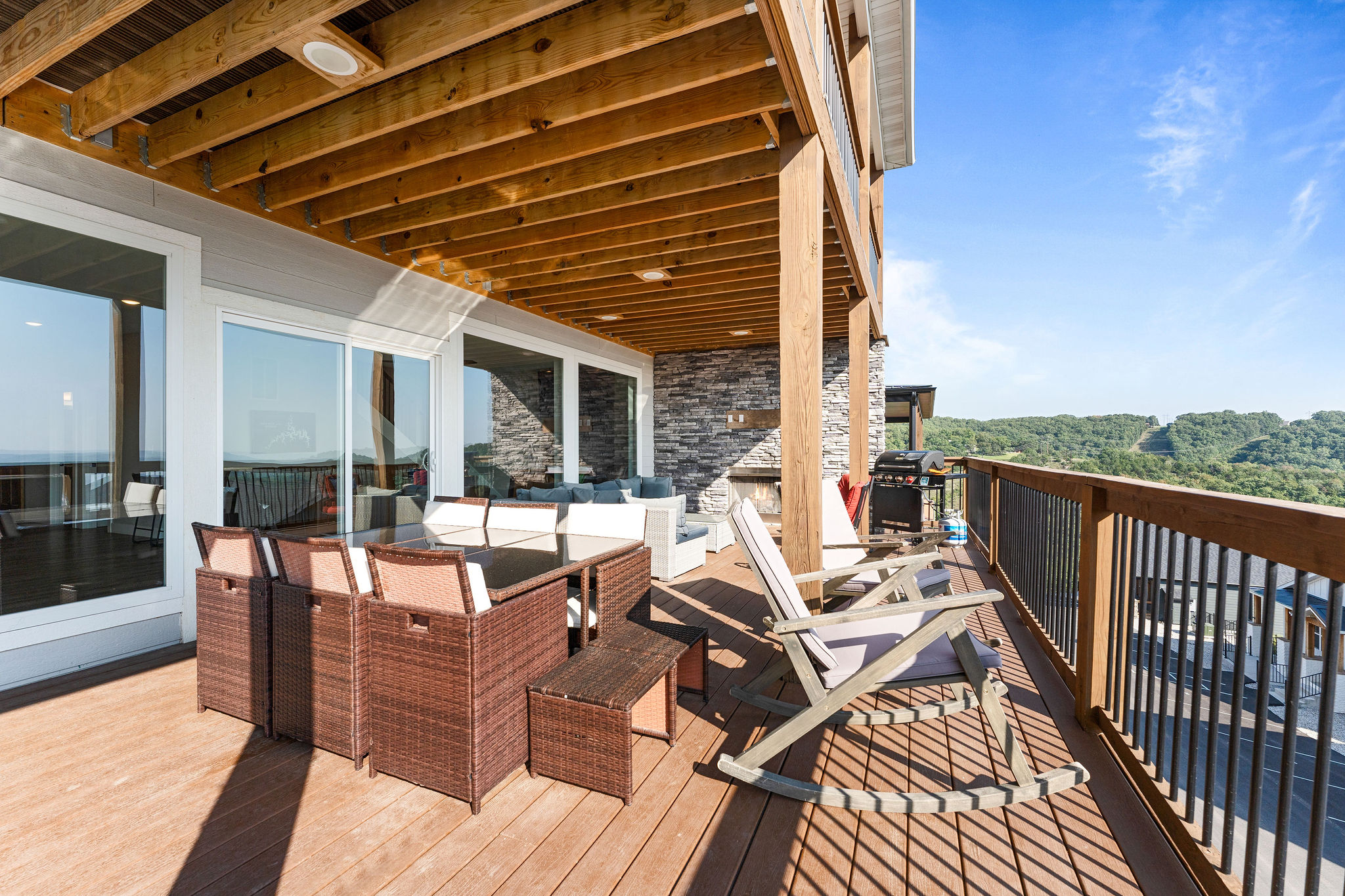 Dine alfresco or just hang out—the back deck has the perfect seat for everyone!