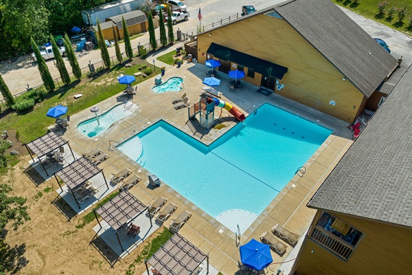 Swim, soak, slide, and play—your group will love the community pool, hot tub, and playground just steps away! 