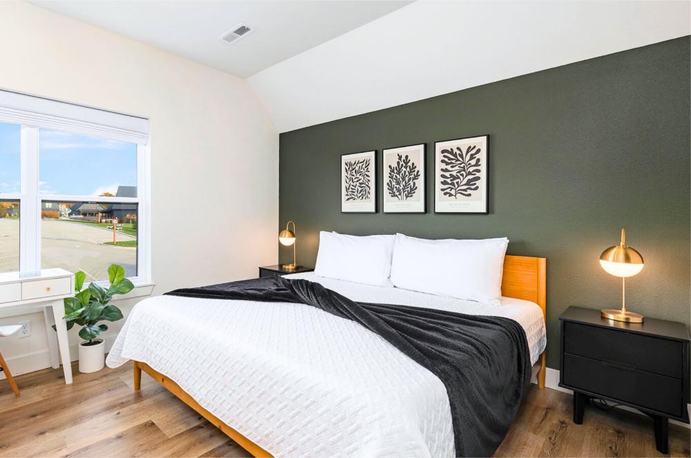 This king and trundle bedroom features memory foam mattresses and a private ensuite bathroom.