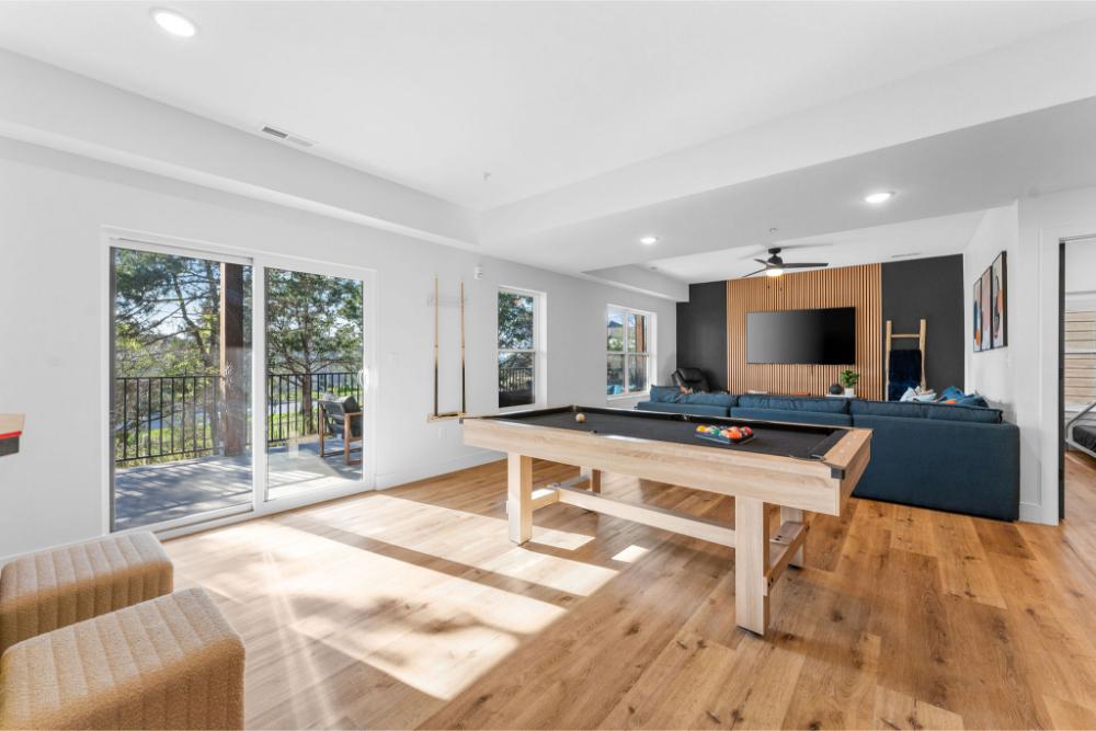 Multiple entertainment areas pair with a patio overlooking scenic Table Rock Lake.