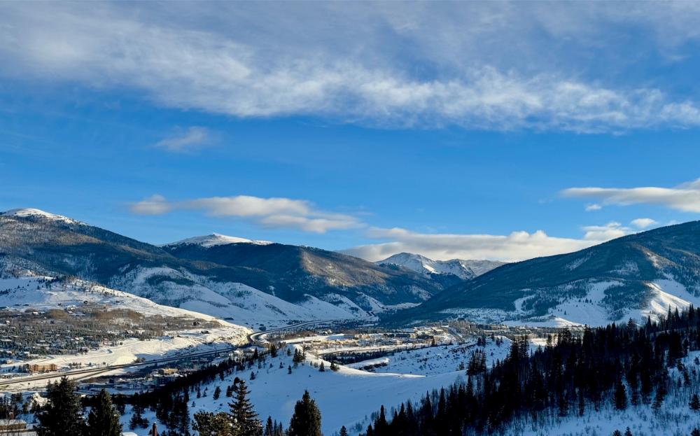 Take in spectacular views of the Rockies from this cozy mountain condo—the perfect place to unwind after hitting the slopes.