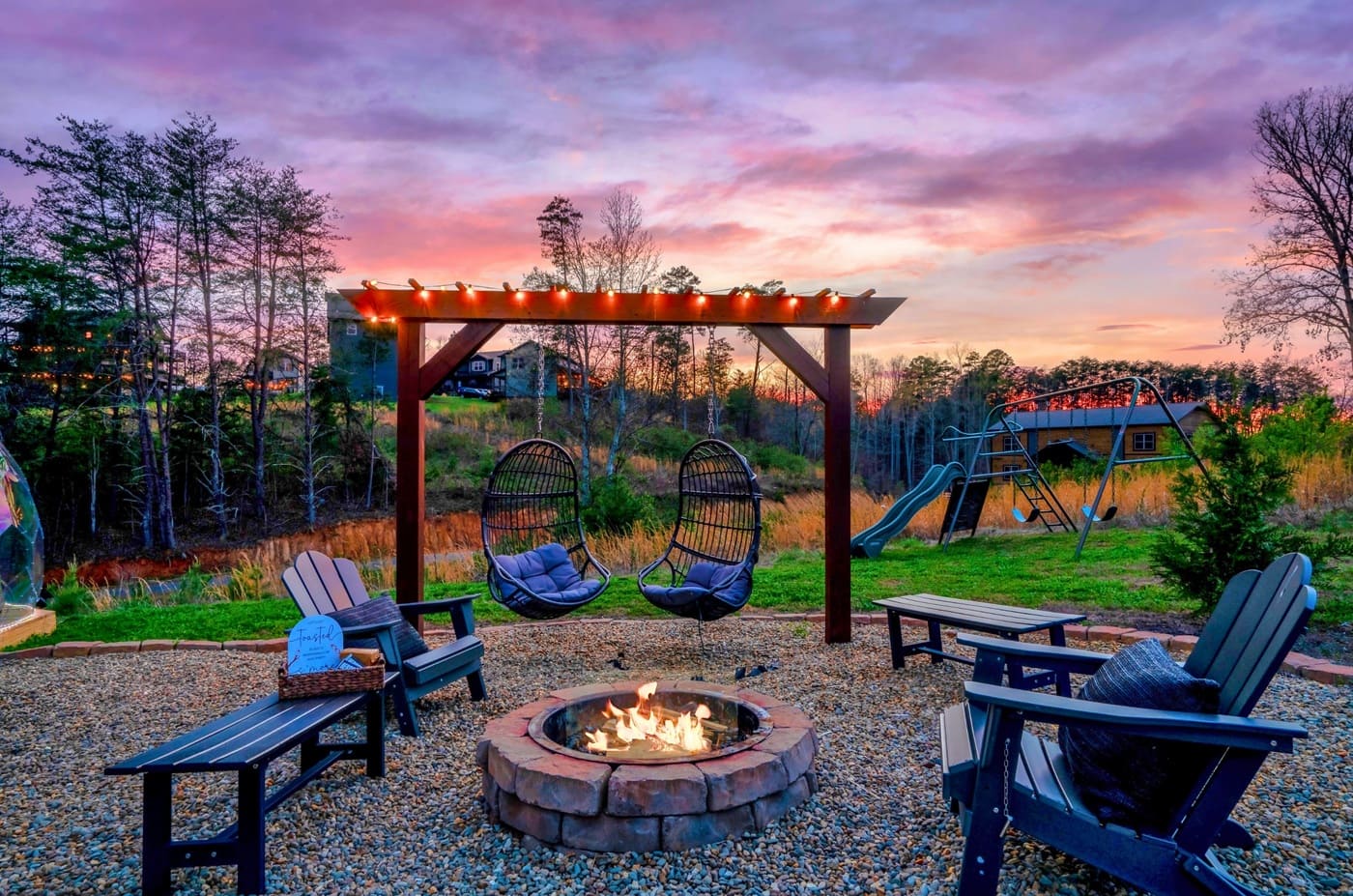 Relax by the fire or sway in the hanging chairs as the sun sets and the lights come on.