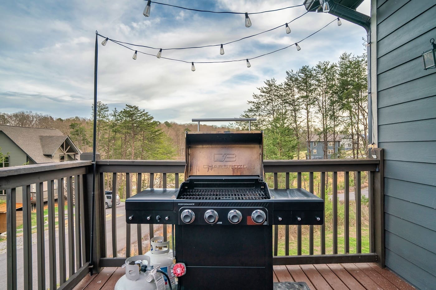 Fire up the grill and enjoy an easy evening meal with views and café-style string lights overhead.