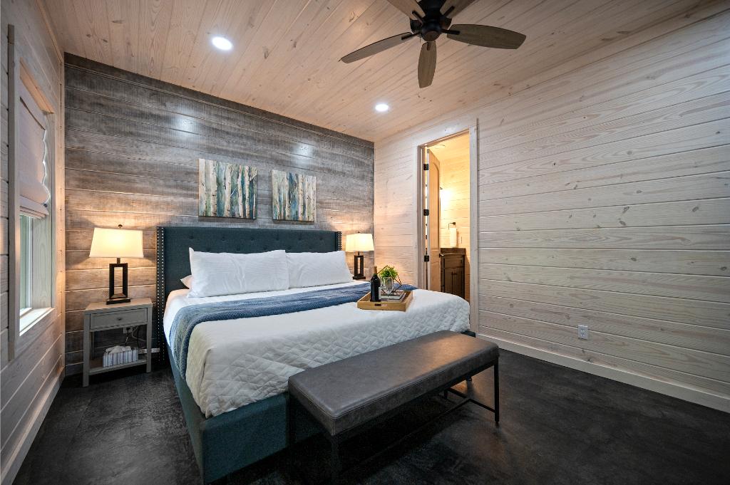 Wake up, step outside, and enjoy the hot tub from this comfortable master suite with direct access.