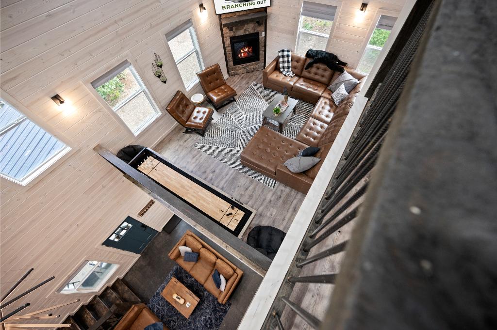Three levels of space offer games upstairs and cozy areas below for relaxing and recharging.
