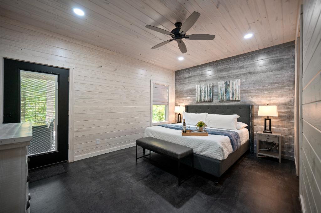 Wake up in the master suite and step straight out to the hot tub, complete with a king bed, private bath, and easy deck access.