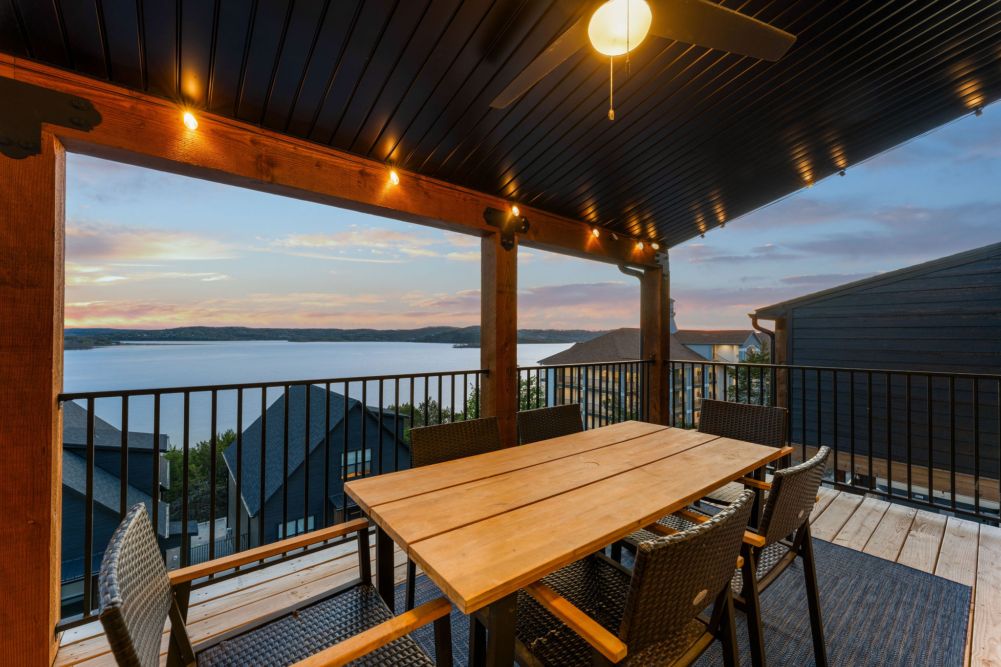 Enjoy amazing, serene sunsets over Table Rock Lake right from the expansive back decks at The Branson GOAT.