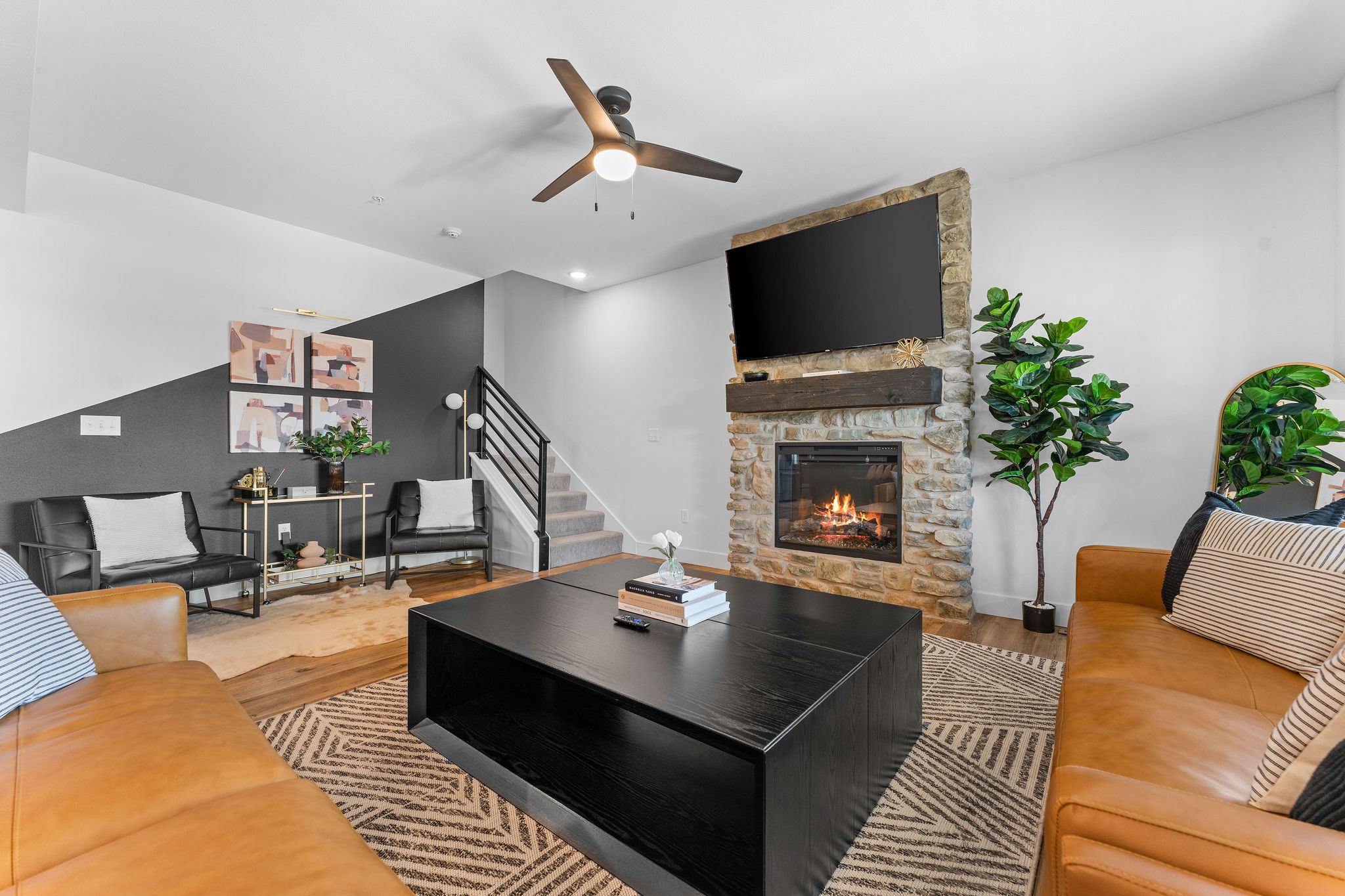 Curl up next to the fireplace or enjoy a movie on the big screen, comfort all year round.