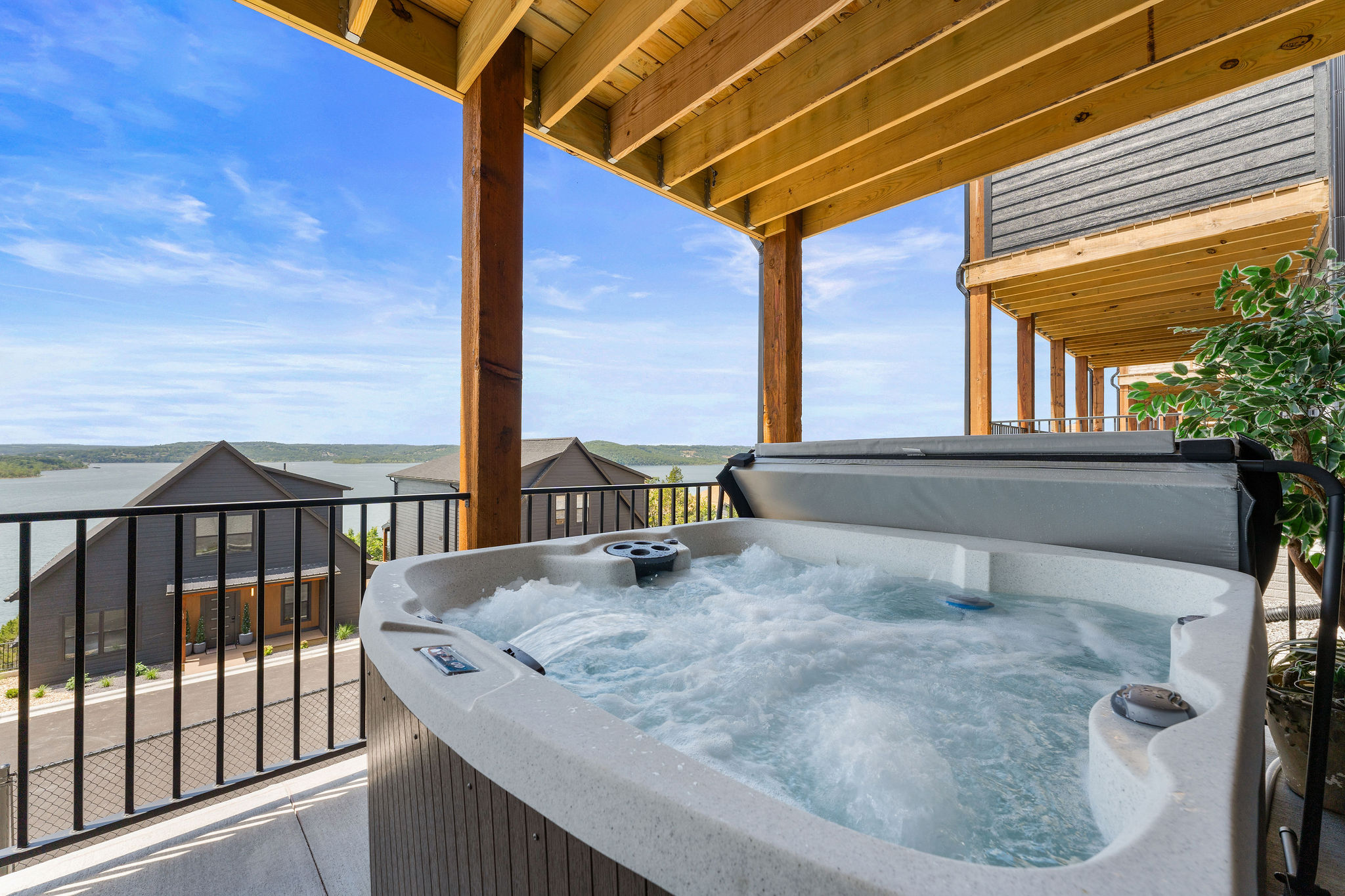 Soak your stress away in the hot tub while gazing out over the peaceful waters of Table Rock Lake—pure relaxation, anytime.